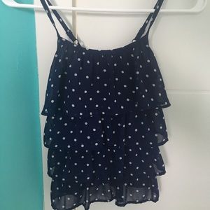 Cute purple, flowy tank with adjustable straps.